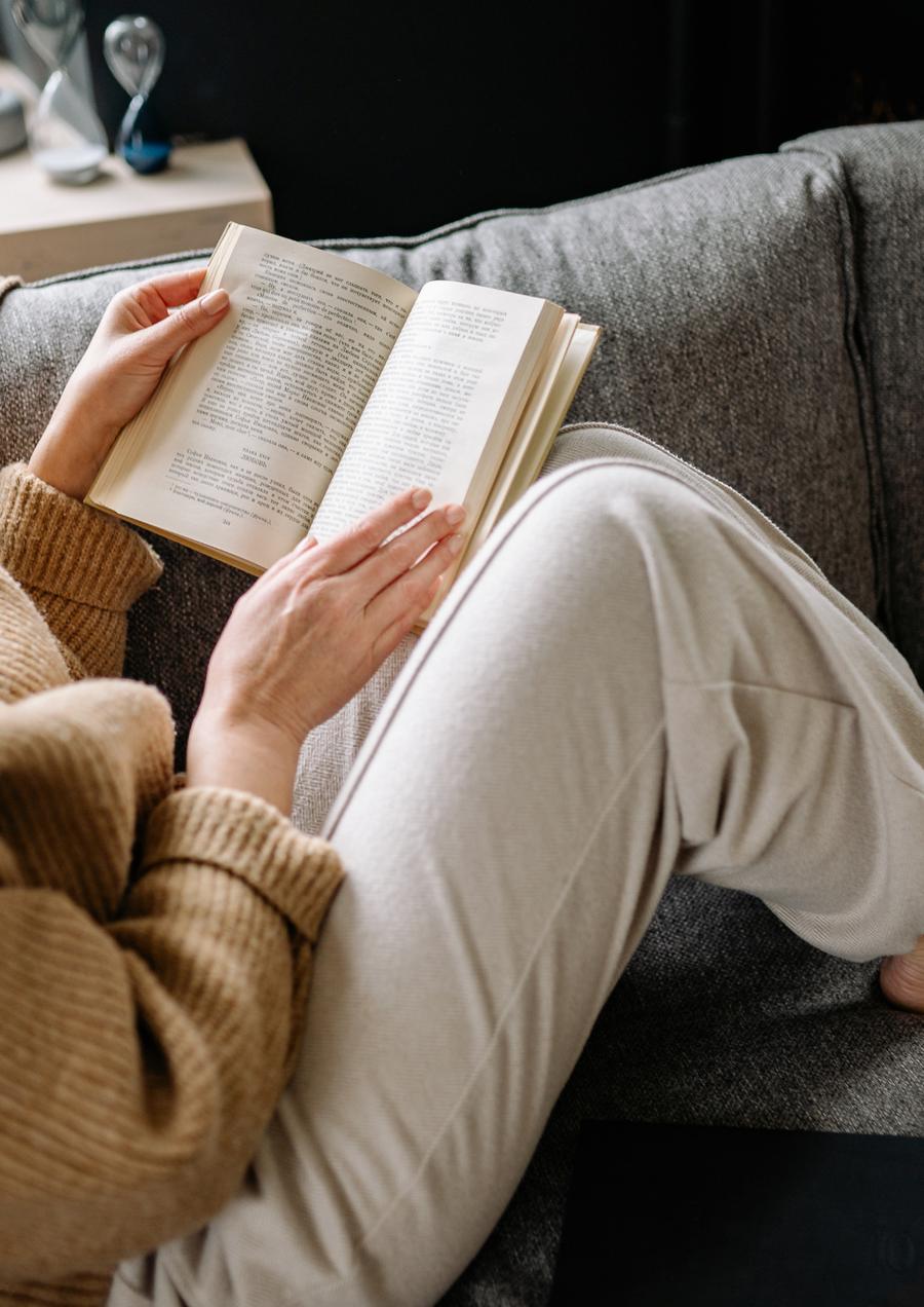 Curled up on the couch with a book